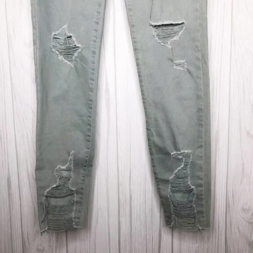 AMERICAN EAGLE Seafoam Destroyed Skinny Jeans